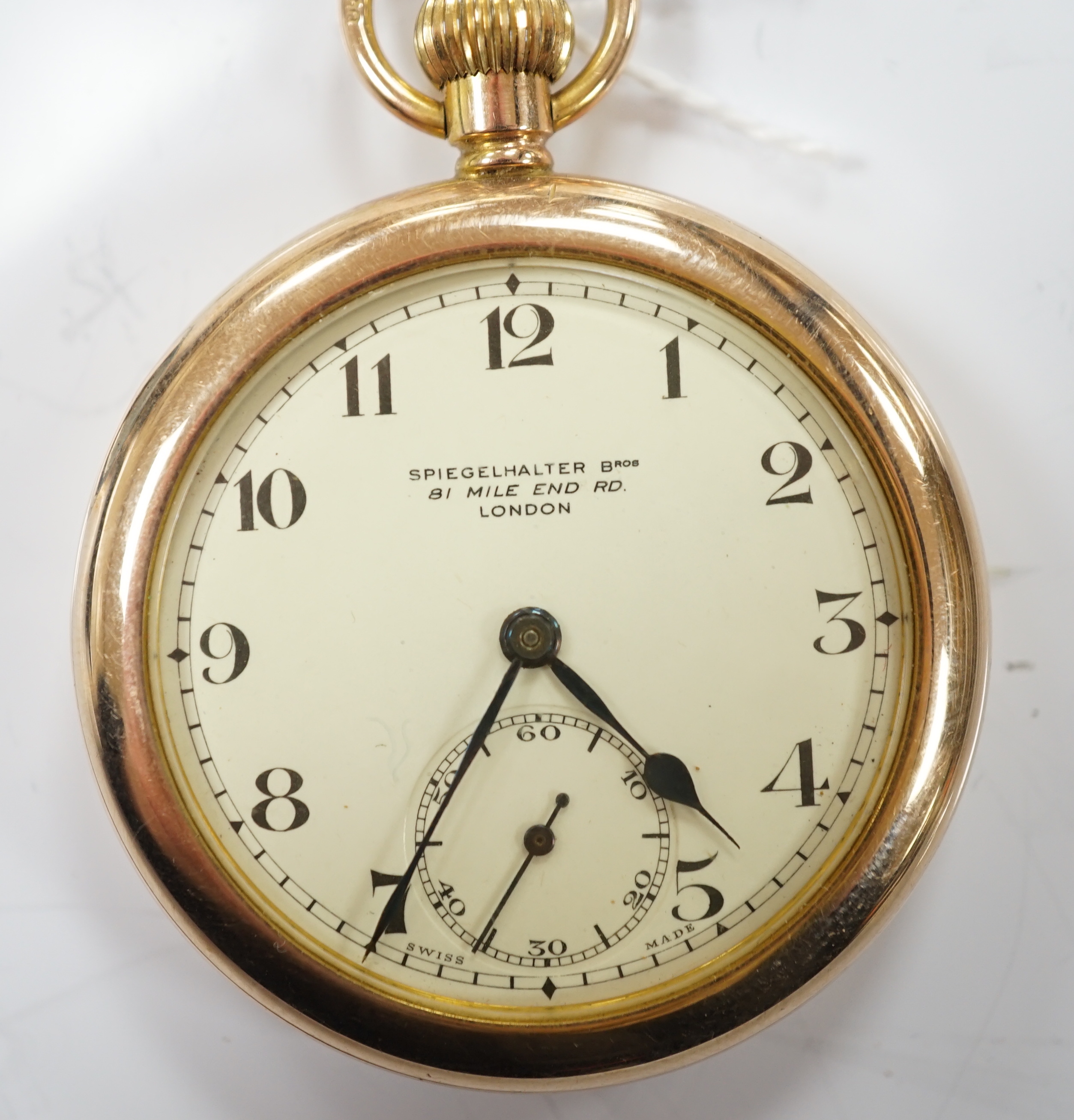 An early 20th century 9ct gold open face pocket watch, retailed by Spiegelhalter Bros, with Arabic dial and subsidiary seconds, case diameter 47mm, gross weight 61.2 grams.
